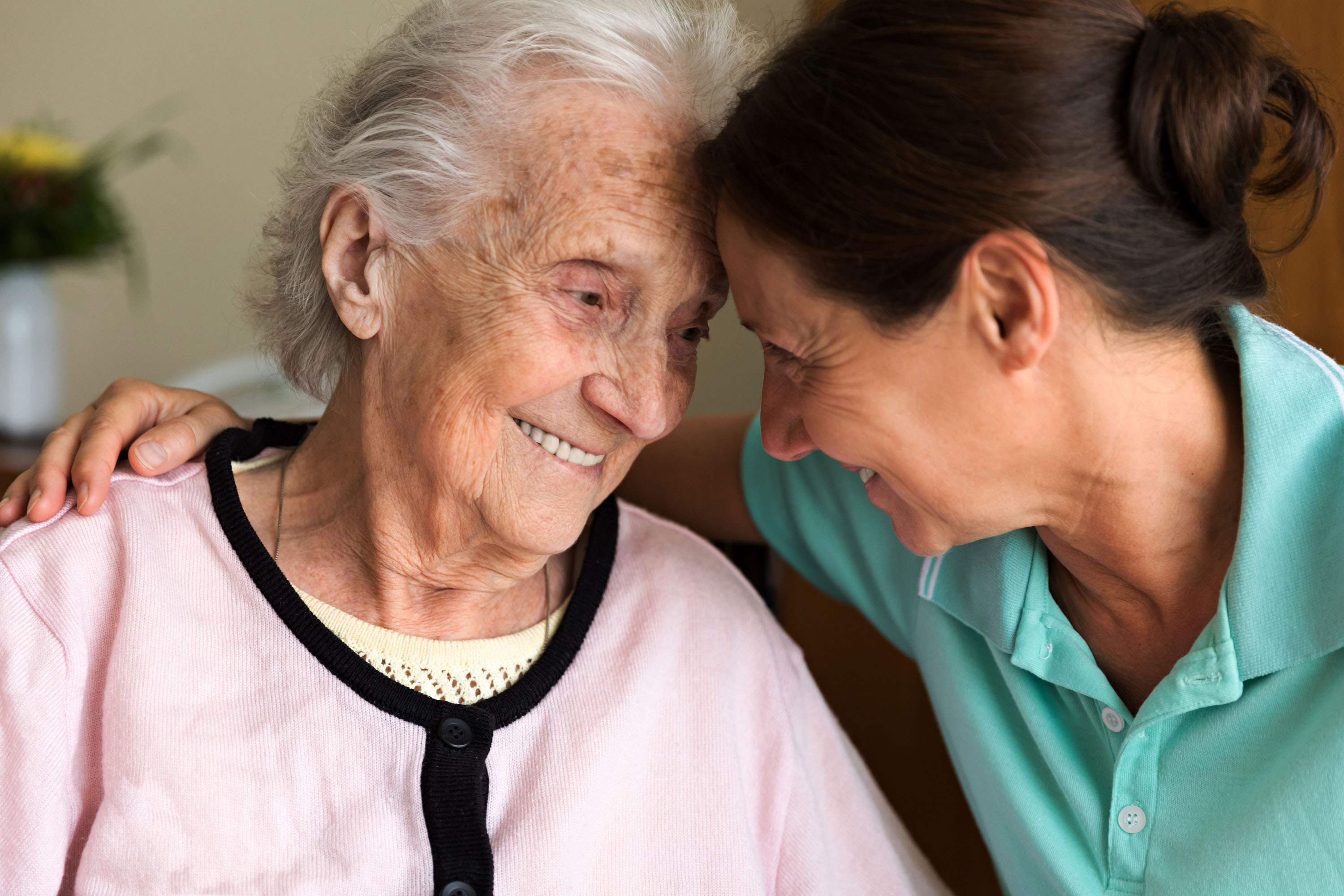 A nurse comforting a woman
