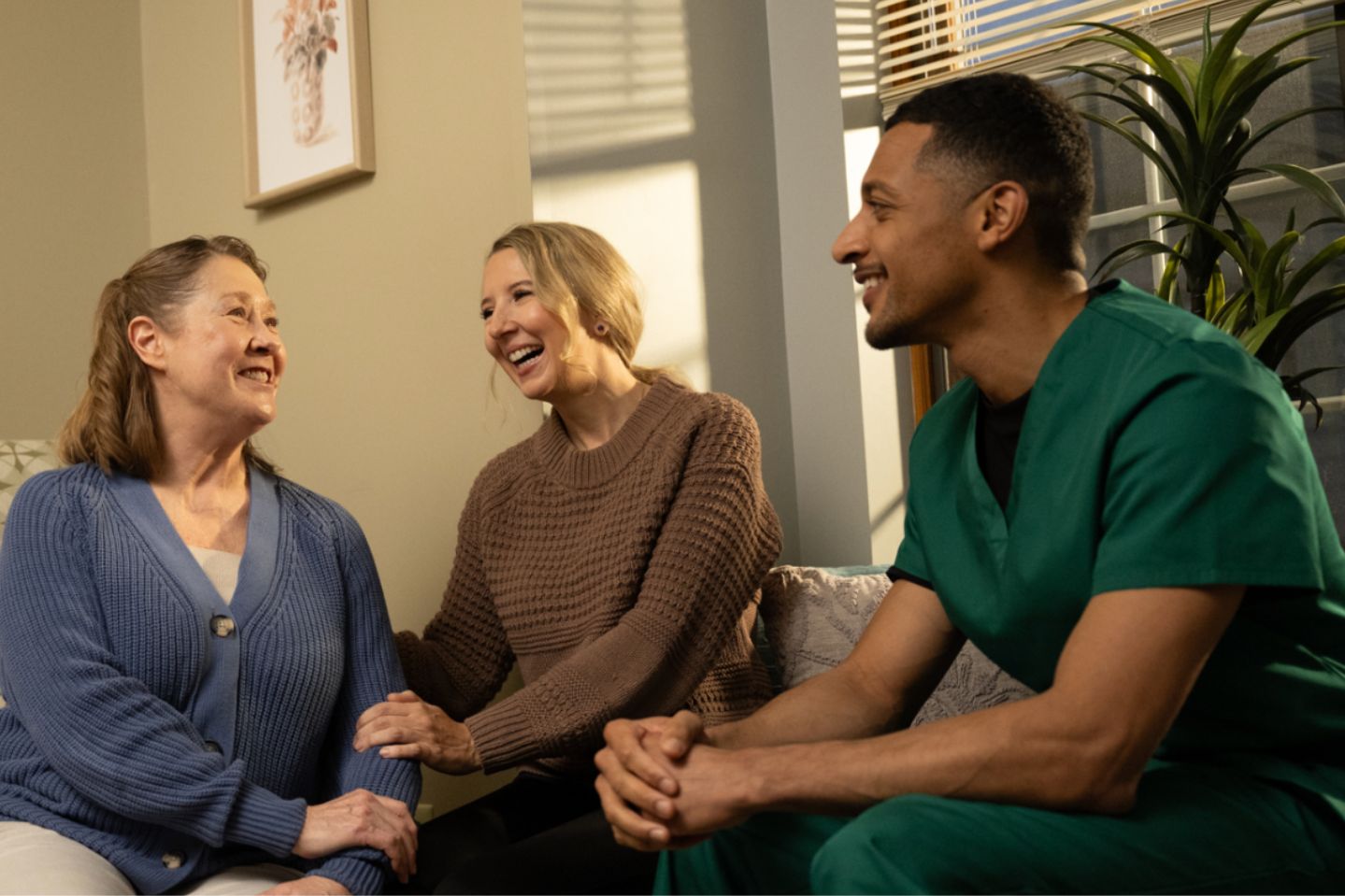 A nurse talking with a resident