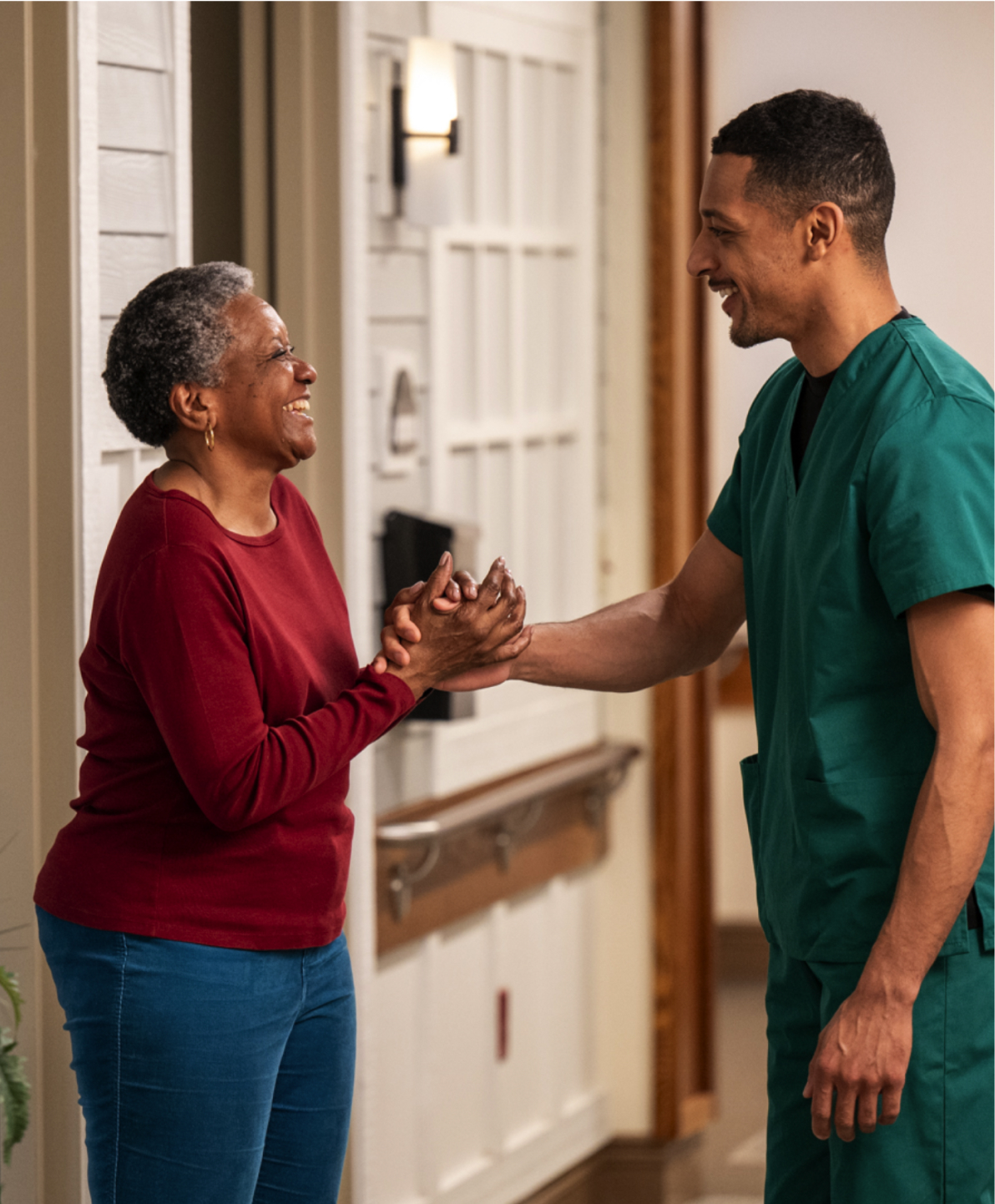A nurse greeting a resident